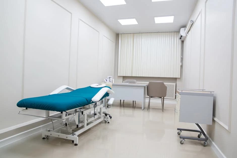 Cleaning technician in a medical office using hospital-grade disinfectants on clinical surfaces